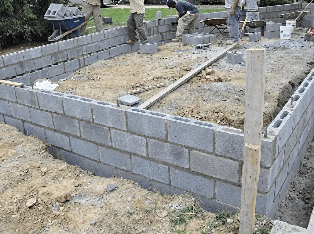 Professionals building a foundation with blocks in Chicago, IL
